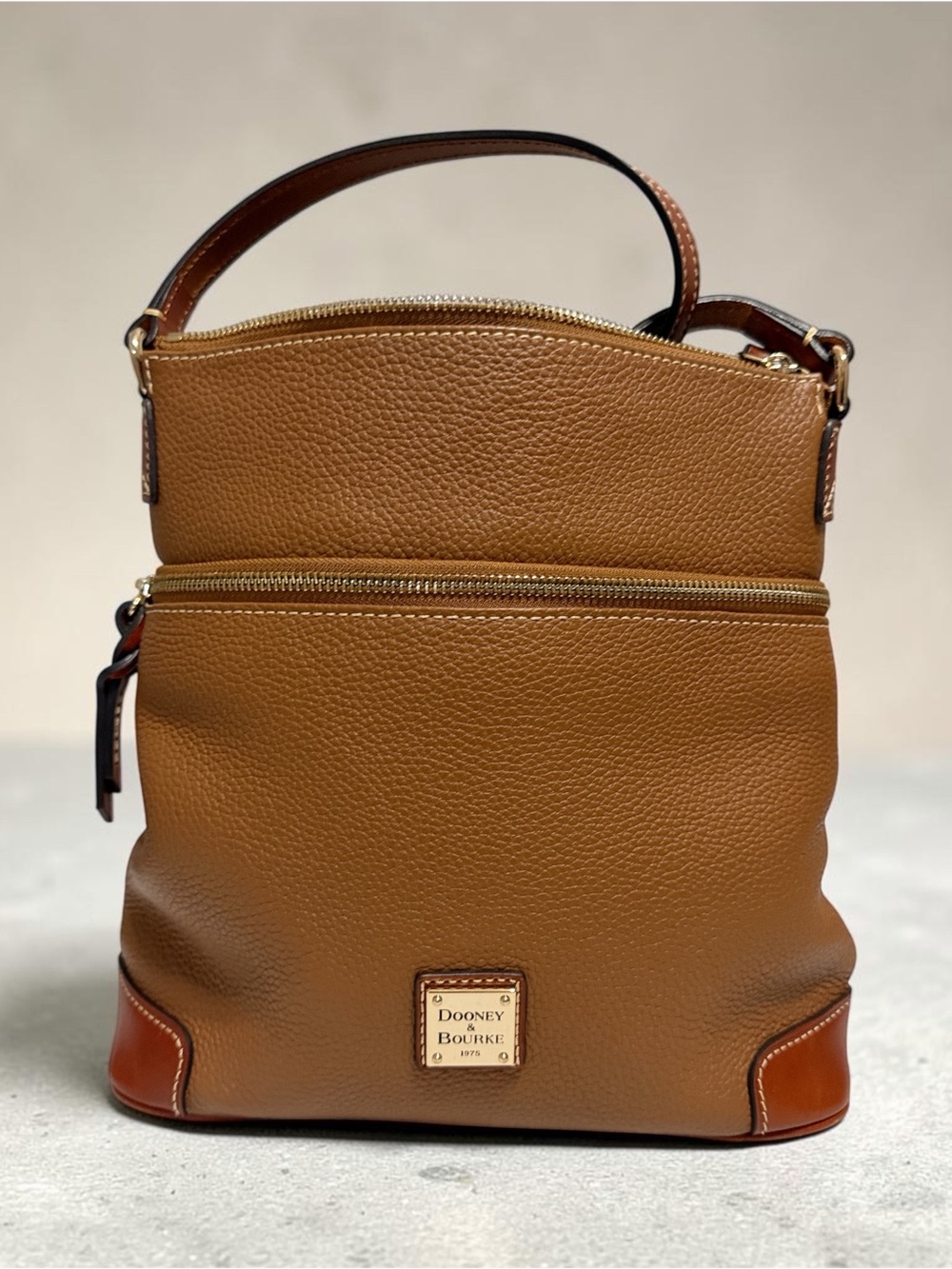 Dooney & Bourke Brown Pebble Leather Messenger Bag with Tan Accents